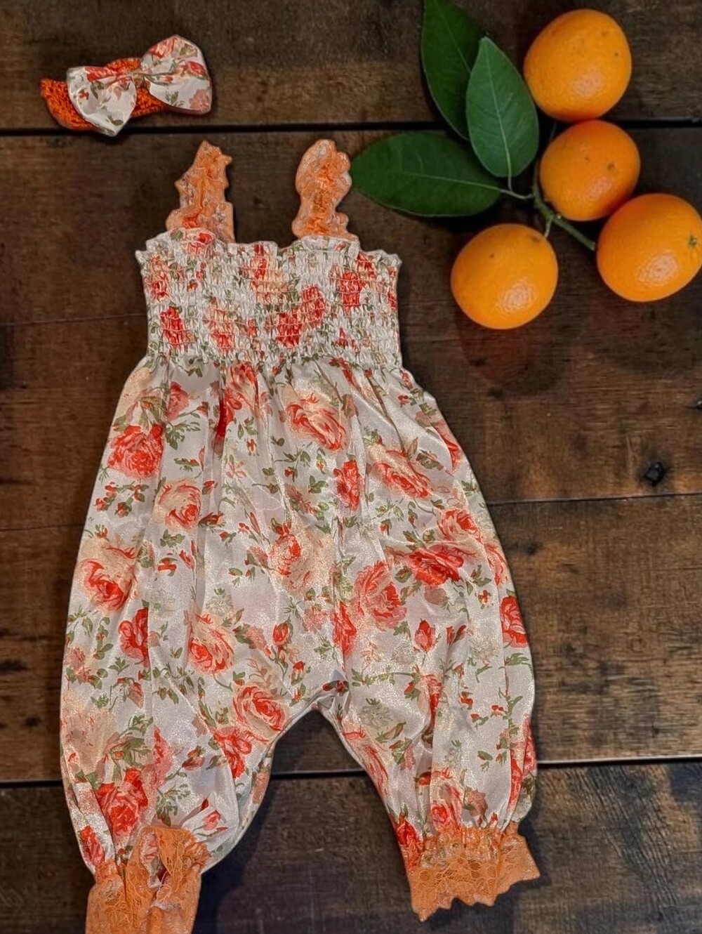 Girls Floral Smocked Romper Orange Accents